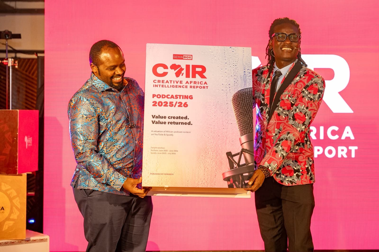 Baraza Media Lab Executive Director Eric Kinaga (left) and SemaBOX Founder and Chief Executive Officer Dan Aceda display a copy of the Creative Africa Intelligence Report 2026 during its launch in Nairobi on October 19, 2026.